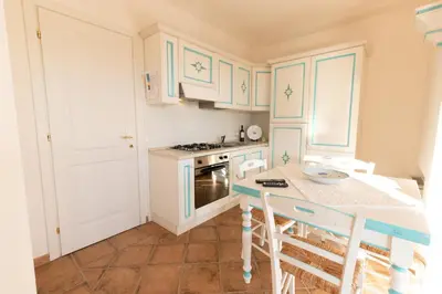 Cucina o angolo cottura di Perseo case vacanze Poggio dei fiori con piscina privata