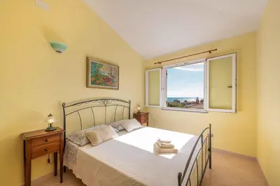 Letto o letti in una camera di Holiday home in Cala Gonone 34685