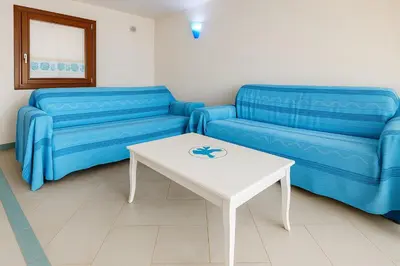 Area soggiorno di Wind Rose -Group Beach House near the Sea