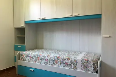 Letto o letti in una camera di VILLAROSA Views