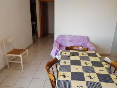Letto o letti in una camera di Orosei-Sardegna-Appartamento 5 posti letto con giardino