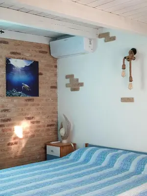 Letto o letti in una camera di Villa Panamàr