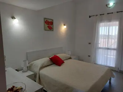Letto o letti in una camera di Casa Pillina
