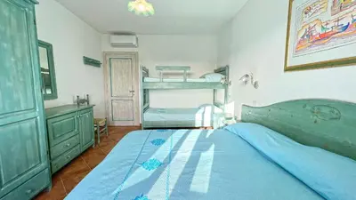 Letto o letti in una camera di Le Residenze del Maria Rosaria - Via Trentino 62