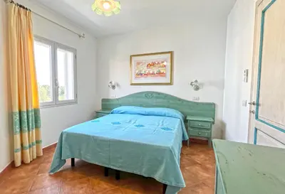 Letto o letti in una camera di Le Residenze del Maria Rosaria - Via Trentino 62
