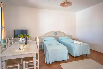 Letto o letti in una camera di Le Residenze di Via Leonardo da Vinci 14