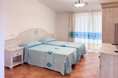 Letto o letti in una camera di Le Residenze di Via Leonardo da Vinci 14