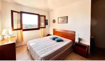 Letto o letti in una camera di DavidHouse San Teodoro