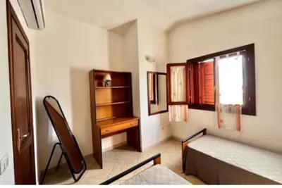 Letto o letti in una camera di DavidHouse San Teodoro