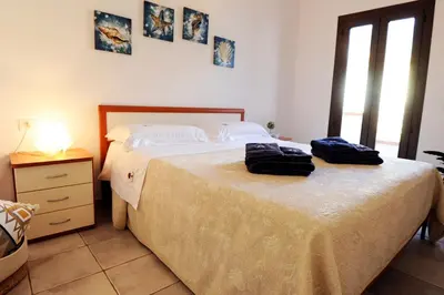 Letto o letti in una camera di Suite Torrigiani