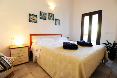 Letto o letti in una camera di Suite Torrigiani