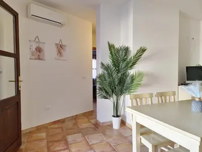 TV o dispositivi per l'intrattenimento presso Le Melodie - Appartamenti con spazi esterni privati a Sos Alinos