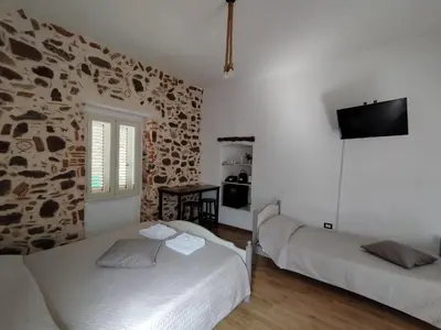 Letto o letti in una camera di Villa Bianca