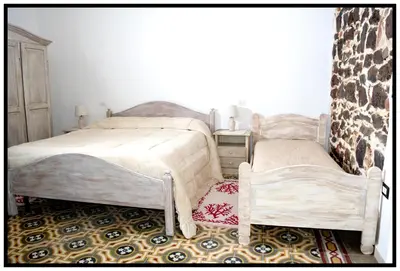 Letto o letti in una camera di Villa Bianca