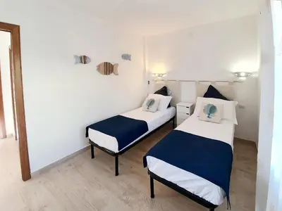 Letto o letti in una camera di Villino Turchese Budoni