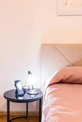 Letto o letti in una camera di Casa Goletta soggiorno per 4 a 2 minuti dalla spiaggia IUNQ0334