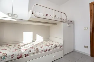 Letto o letti in una camera di Villino Gramsci