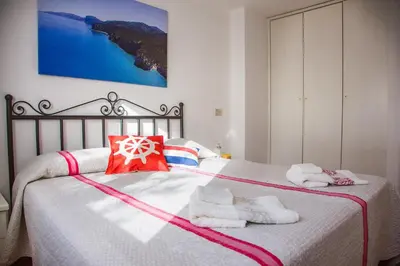 Letto o letti in una camera di Casa Delta delle Acque Vista spettacolare e Giardino
