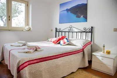 Letto o letti in una camera di Casa Delta delle Acque Vista spettacolare e Giardino