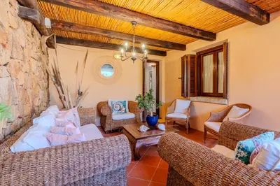 Area soggiorno di Villa Capo Coda Cavallo piscina privata