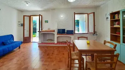 Area soggiorno di Appartamento Residenziale Trilocale 4 posti letto via Loiri
