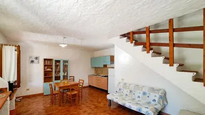 Cucina o angolo cottura di Appartamento Residenziale Trilocale 4 posti letto via Loiri