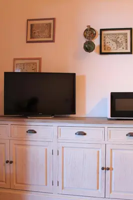 TV o dispositivi per l'intrattenimento presso Casa Tramontana - Cala Gonone