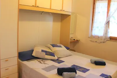 Letto o letti in una camera di Casa Tramontana - Cala Gonone