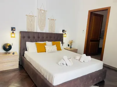 Letto o letti in una camera di Le residenze del mare