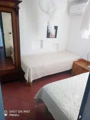 Letto o letti in una camera di Ferienhaus Panorama, San Teodoro, Isuledda