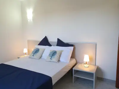 Letto o letti in una camera di Villette Miramare