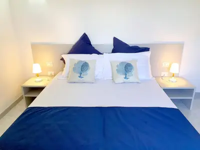 Letto o letti in una camera di Villette Miramare