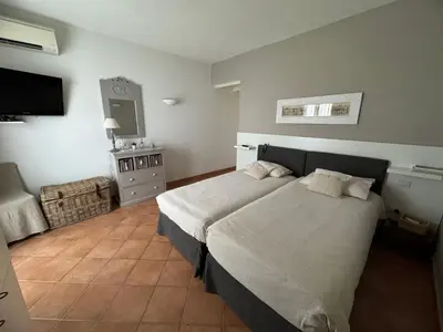 Letto o letti in una camera di Villa Carlotta