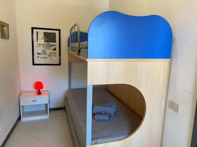 Letto o letti in una camera di Casa Piccy