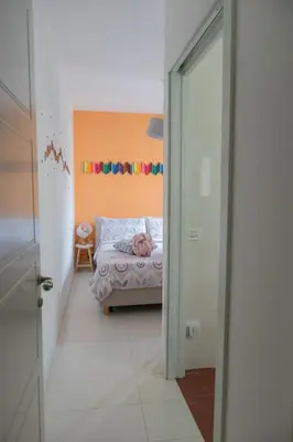 Letto o letti in una camera di Intra Rooms