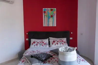Letto o letti in una camera di Intra Rooms