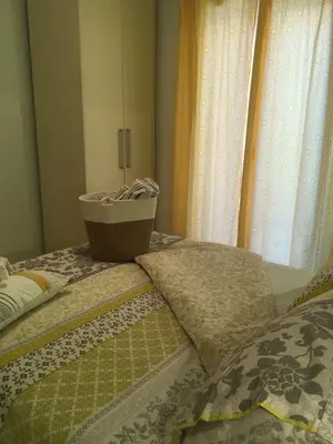 Letto o letti in una camera di Intra Rooms