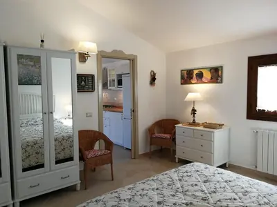 Letto o letti in una camera di Lu Nidu
