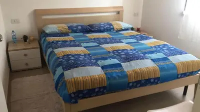 Letto o letti in una camera di Trilocale con cortile