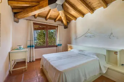 Letto o letti in una camera di Villa Danza dei Fenicotteri