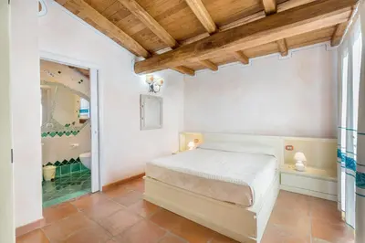 Letto o letti in una camera di Villa Danza dei Fenicotteri