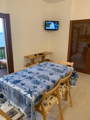 TV o dispositivi per l'intrattenimento presso Appartamento in Costa Smeralda - Bilocale sul mare - Sea View