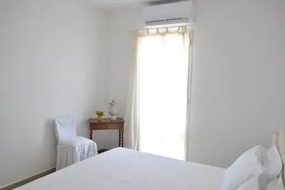Letto o letti in una camera di Casa Antu - Appartamento con 2 camere in centro abitato