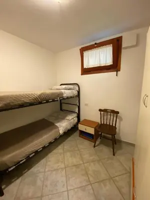 Letto o letti in una camera di Casa Rosa