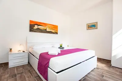 Letto o letti in una camera di Terre di gallura