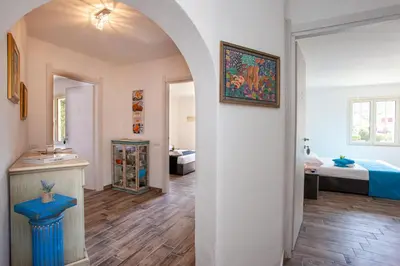 Letto o letti in una camera di Terre di gallura