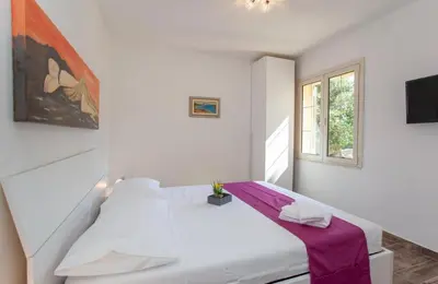 Letto o letti in una camera di Terre di gallura