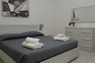 Letto o letti in una camera di Your House