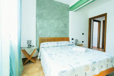 Letto o letti in una camera di Casa Murru