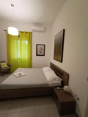Letto o letti in una camera di Gallura Blu